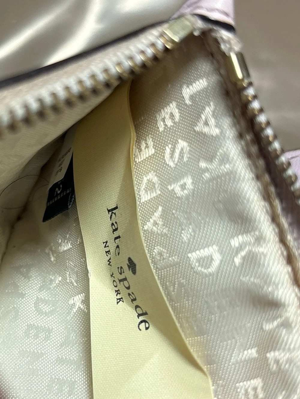 kate spade Light pink Pebbled Leather Zip Wallet with Silver Logo